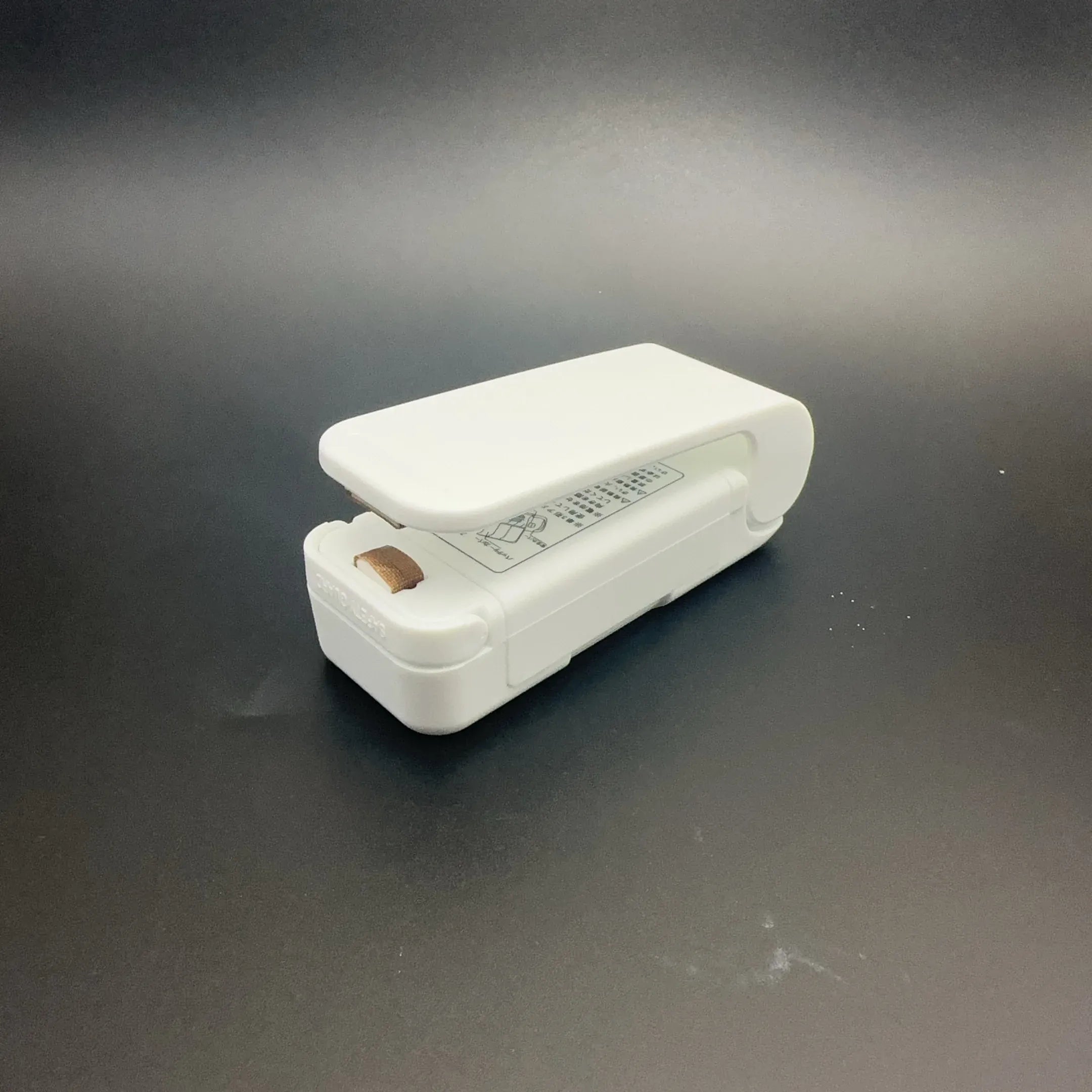 High-Tech Lindjee Mini Heat Bag Sealer Machine - white portable food bag sealer front view
